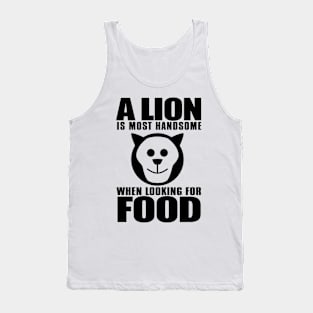 A lion that hunts for survival in the jungle does not envy the one being fed in the zoo Tank Top